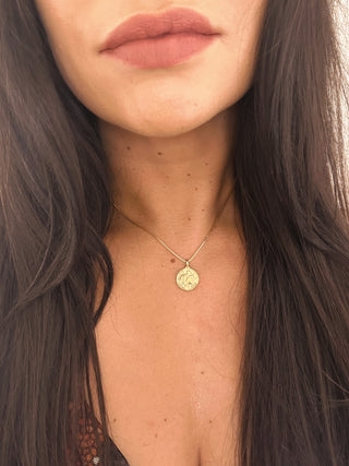 Aquarius 18K Gold Plated NecklaceOur beautiful 18K gold plated Aquarius pendant and chain. Made from a stirling silver base with 18K gold plating, the necklace is water resistant and makes the perfeAquarius 18K Gold Plated Necklace