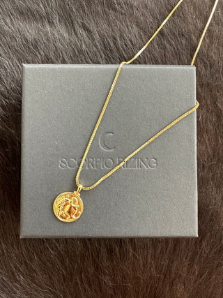 Aquarius 18K Gold Plated NecklaceOur beautiful 18K gold plated Aquarius pendant and chain. Made from a stirling silver base with 18K gold plating, the necklace is water resistant and makes the perfeAquarius 18K Gold Plated Necklace