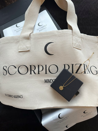 'Occasion Gifting SetLooking for the perfect gift for that Scorpio in your life? Our delicately stylish 18K gold plated Scorpio necklace comes with our best selling Scorpio Cotton Tote BScorpio L'Occasion Gifting Set