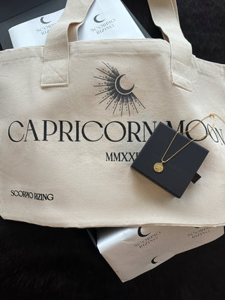 'Occasion Gifting SetLooking for the perfect gift for that Capricorn in your life? Our delicately stylish 18K gold plated Capricorn necklace comes with our best selling Capricorn Cotton Capricorn L'Occasion Gifting Set