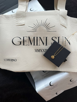 'Occasion Gifting SetLooking for the perfect gift for that Gemini in your life? Our stunning 18K gold plated Gemini necklace comes with our best selling Gemini Cotton Tote Bag and both aGemini L'Occasion Gifting Set