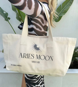 Aries Cotton Tote BagAries slogan canvas tote bag. 100% cotton. Bag dimensions measure 48cm * 42cm * 40 cm. Cool wash only. Free delivery and returns in the UAE. All prices are inclusiveAries Cotton Tote Bag