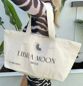 Libra Cotton Tote BagLibra slogan canvas tote bag. 100% cotton. Bag dimensions measure 48cm * 42cm * 40 cm. Cool wash only. Free delivery and returns in the UAE. All prices are inclusiveLibra Cotton Tote Bag