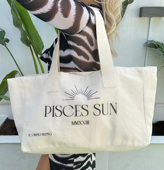 Pisces Cotton Tote BagPisces slogan canvas tote bag. 100% cotton. Bag dimensions measure 48cm * 42cm * 40 cm. Cool wash only. Free delivery and returns in the UAE. All prices are inclusivPisces Cotton Tote Bag